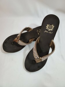yellow box gold flip flops