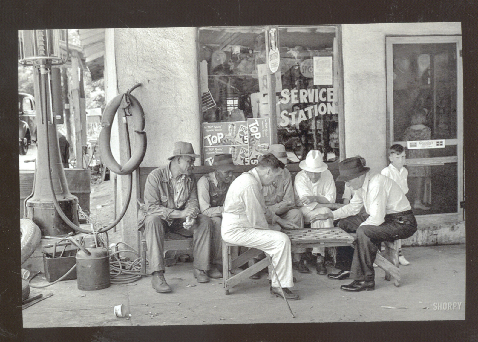REAL PHOTO GREENSBORO GAS STATION CHECKERS GAME POSTCARD COPY