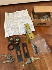 VINTAGE NOS RUSSWIN MORTISE LOCK W DOUBLE CYLINDER & UNCUT KEYS ANTIQUE BRONZE