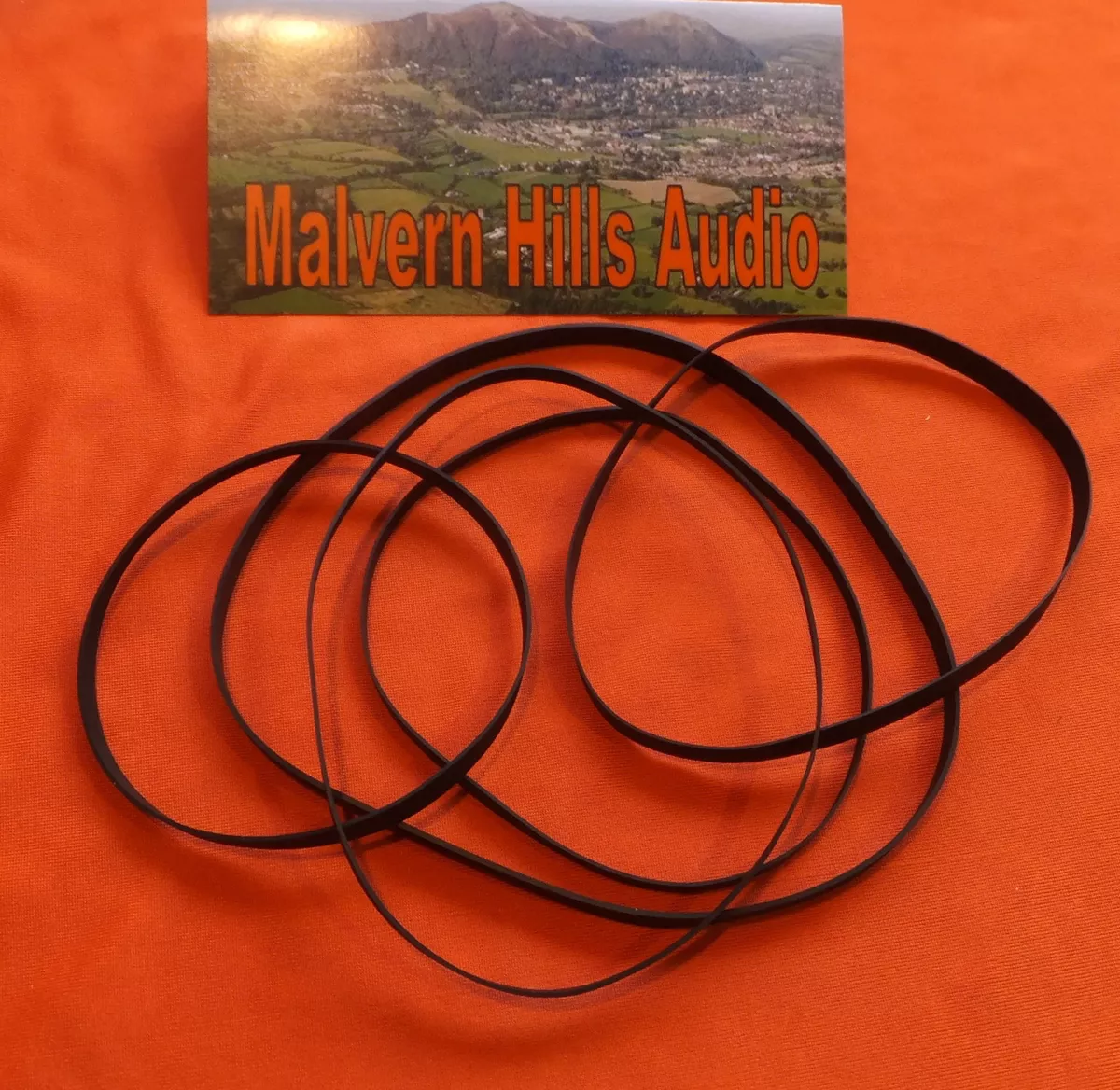 Flat rubber drive clearance belts