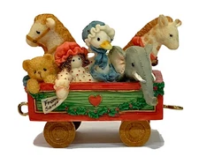 Cherished Teddies 219096 “Rolling Along With Friends And Smiles” Figurines
