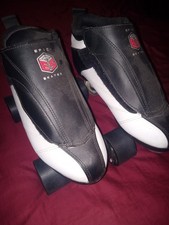 Epic Skates Black and White Quad Roller Skates with Evolve Wheels Carry Bag