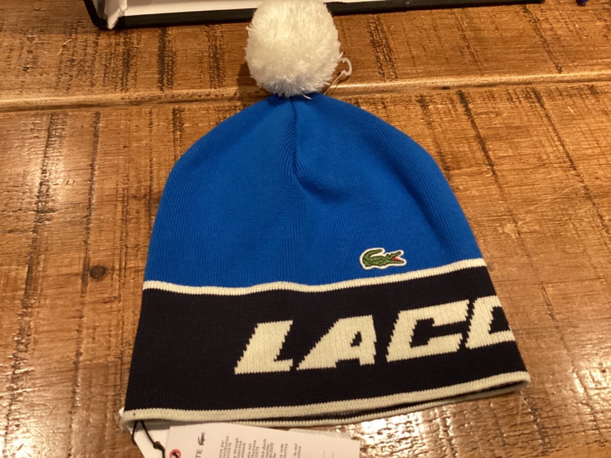 LACOSTE POMPOM BOBBLE HAT BRAND NEW OSFM NAVY BLUE WHITE UK