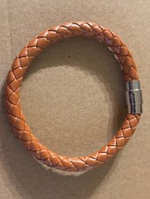 braided faux leather magnet therapy bracelet w/ stainless steel magnetic clasp.