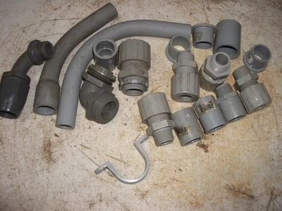 assorted PVC 1/2" and 3/4" electrical conduit and strain relief fittings - Image 1 of 4