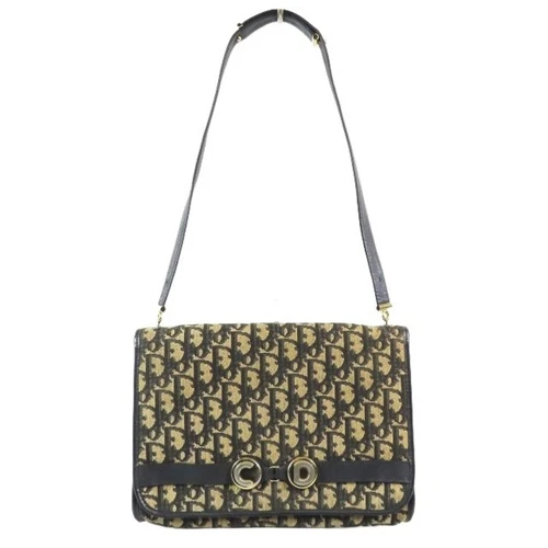 Sac à main bandoulière Dior vintage Christian CD logo trotteur rabat or occasion 787fb