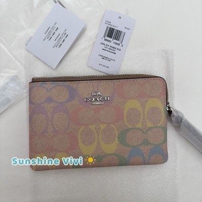 NWT Coach Corner Zip Wristlet In Rainbow Signature Canvas/Sv/Sand Multi CDF28