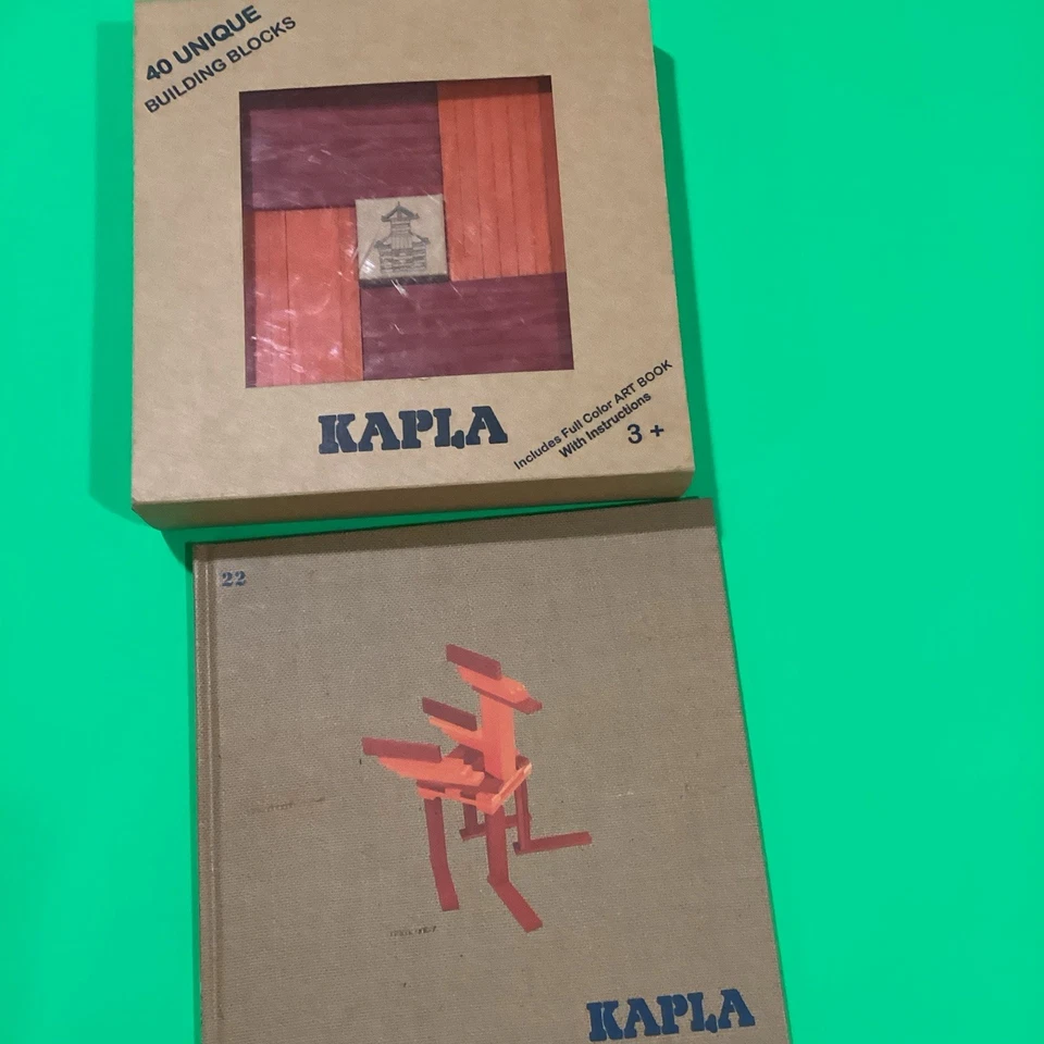 Bloques Kapla - Kit de construcción con libro de ideas Tablones rojos anaranjados en excelente estado Foto 2 de 4