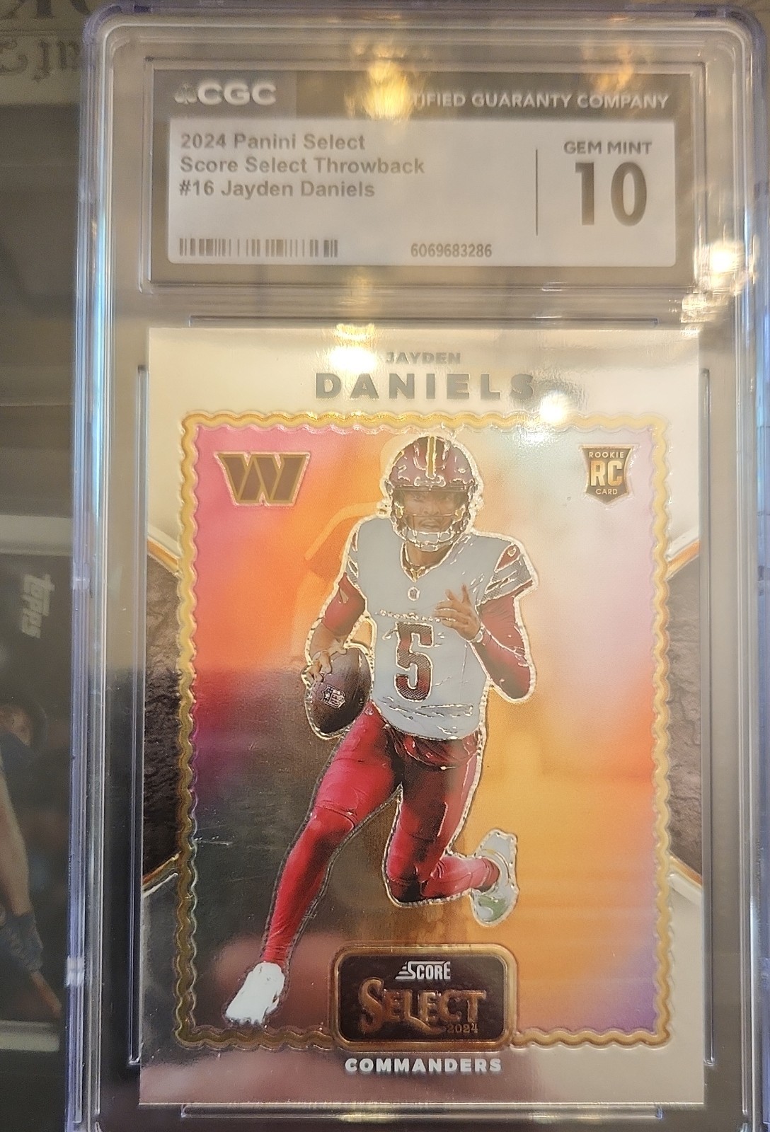 2024 Panini Select - Score Select Throwback Jayden Daniels #16 Silver Prizm (RC)