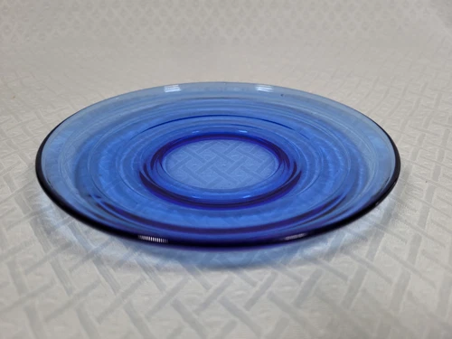 Hazel Atlas Depression glass: a vintage 5.5-inch cobalt blue glass plate/saucer.