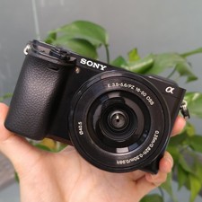 Sony Alpha A6000 Mirrorless Digital Camera w/16-50mm Lens English Language Black