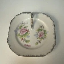 Guilt Saucer With Gold Trim, And Flower Design
