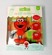 "Glo Pals" Liquid Activated Light Up Cube with Character - Sesame Street Elmo