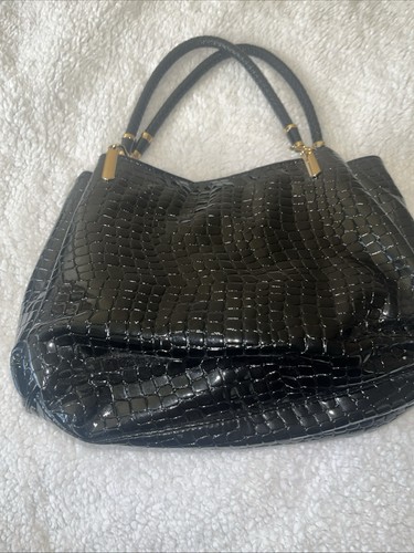 Used patent leather handbag in good condition