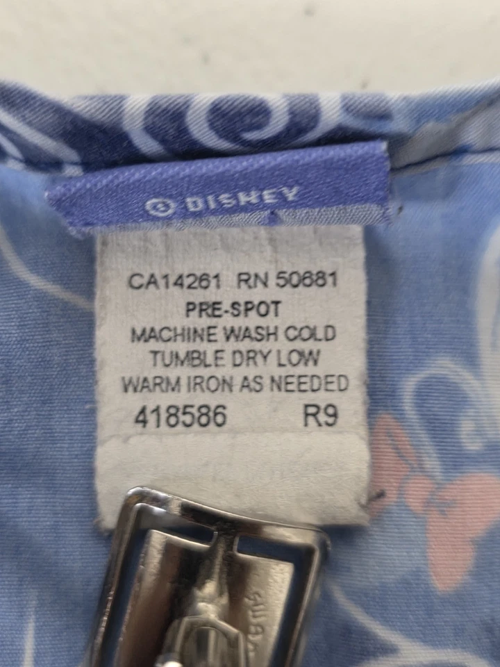 Blusa Médica Estampada de Disney Winnie the Pooh Eeyore Piglet Estrellas Azules Luna Foto 4 de 4