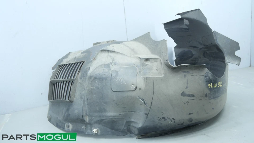 Guardabarros interior delantero izquierdo Jaguar XF 2010-2019 revestimiento protector contra salpicaduras OEM AW93-166563 Foto 2 de 4