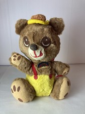 Vintage Teddy bear in yellow and red outfit