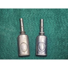 Vintage pair of miniature pocket metal Thumb press oil can... made in USA.