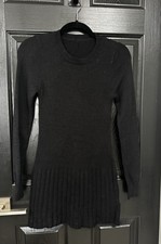 Women  s black ribbed sweater dress featuring a crew neckline Size S