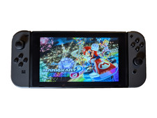 Nintendo Switch Konsole Grau 32 GB mit Joy-Cons, Dock, Handgelenkschlaufen