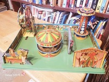 NICE VINTAGE 1930's WYANDOTTE TIN LEVER WIND CIRCUS CARNIVAL TOY