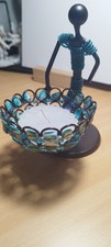 Kreativer Metallkerzenst&auml;nder, Frau am  Waschtrog