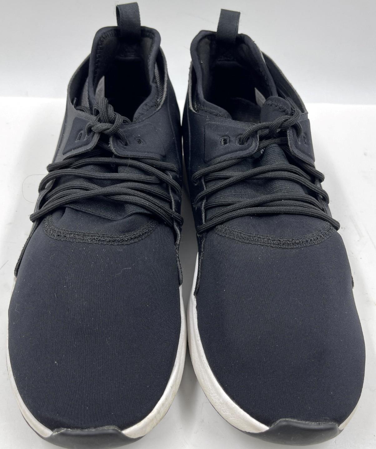 reebok training guresu sneakers in black