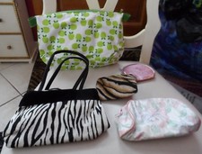 Lot of 5 cosmetics cases in a variety of patterns and sizes