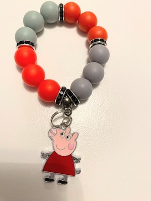 Handcrafted Beaded Stretchable Red And Gray Bracelet With Peppa Pig Charm