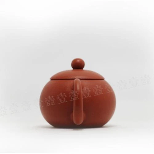 Tetera china zisha marcada xishi olla de té yixing tetera china tamaño pequeño Foto 2 de 4