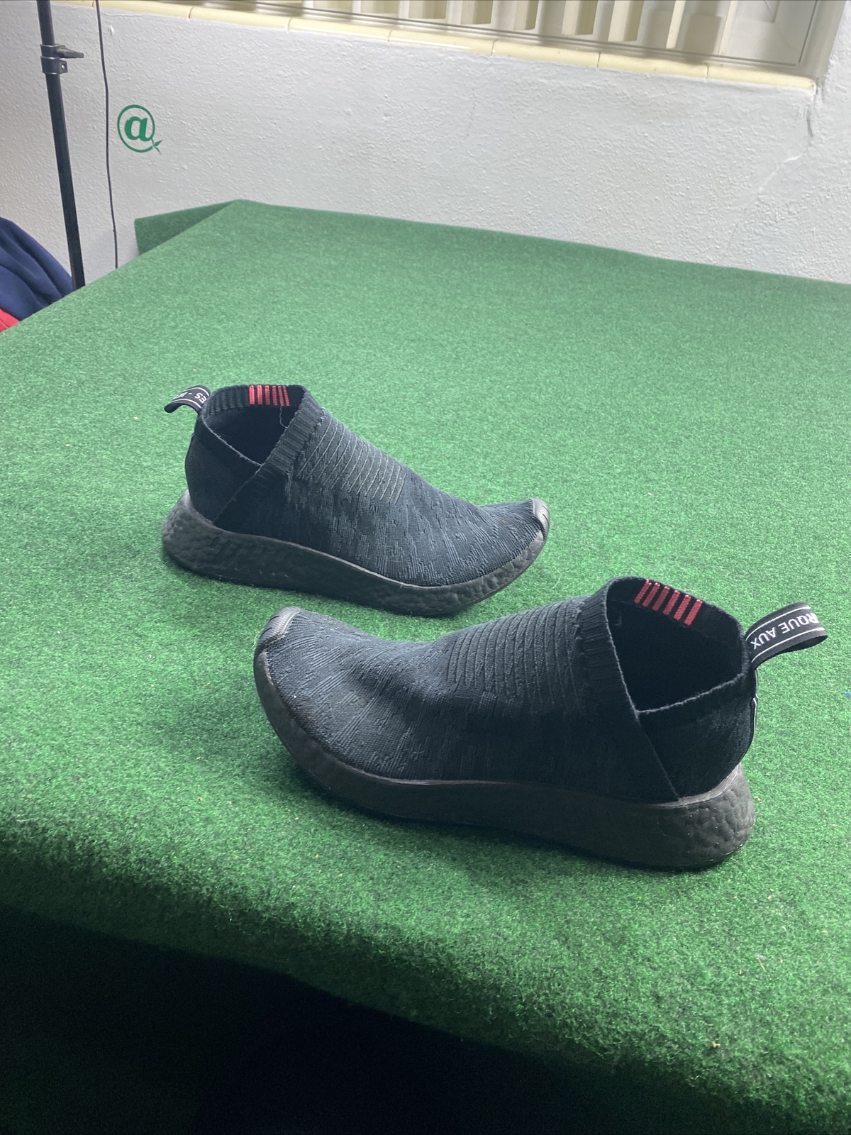 nmd cs2 triple black shock pink