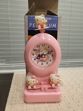 Vintage  Hello Kitty Pendulum Kinetic Clock Battery Operated