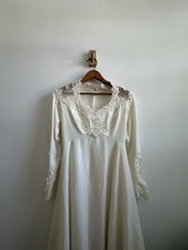 Vintage Offwhite Long Sleeved Lace Detailed Wedding Gown With Cape Feature