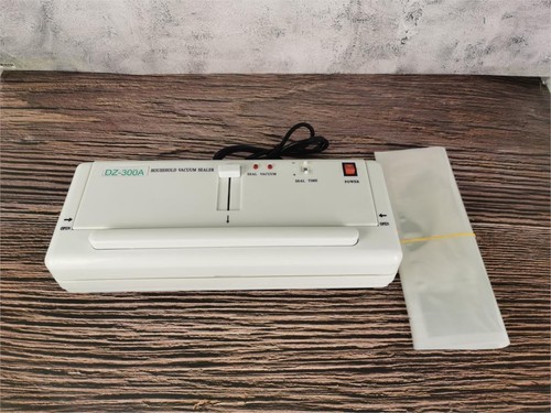 Petit sac lisse machine d'emballage sous vide conservation des aliments joint sous vide DZ-300A - Photo 1/6
