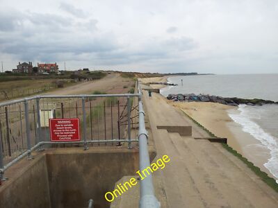 Photo 12x8 Sea defences at Sole Bay Southwold Easton Cliffs can be seen fu c2012