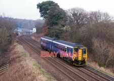 PHOTO  CLASS 156 UNIT 156486 APPROACHES FARLAM ROAD WITH THE 14.24 PASSENGER SER