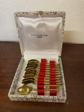 SET OF 12 EMPIRE STYLE GOLD-PLATED MOCHA SPOONS IN A BOX