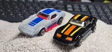 2 LESNEY MATCHBOX SUPERFAST CHEVROLET CORVETTES, 1 BLACK AND 1 SILVER