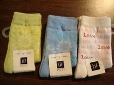 3 pr Gap baby Girl socks 6-12 mos. Love on white, 1 lime floral, 1 blue floral
