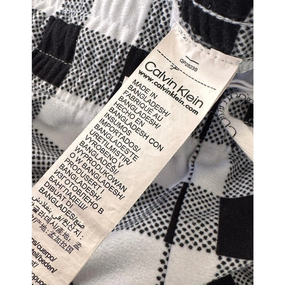 Pantalones de salón Calvin Klein para mujer talla mediana negros blancos a cuadros  Foto 4 de 4