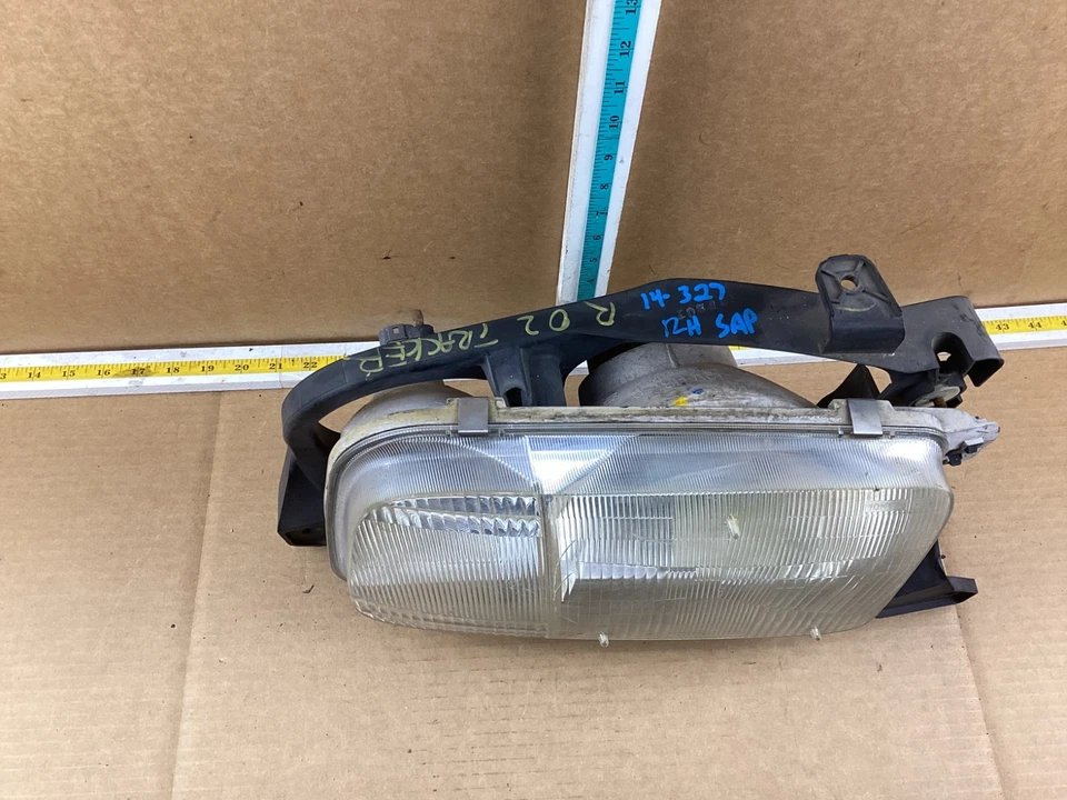 Faro derecho pasajero Chevrolet Tracker 1999-2004 114-60070 OEM Foto 2 de 4