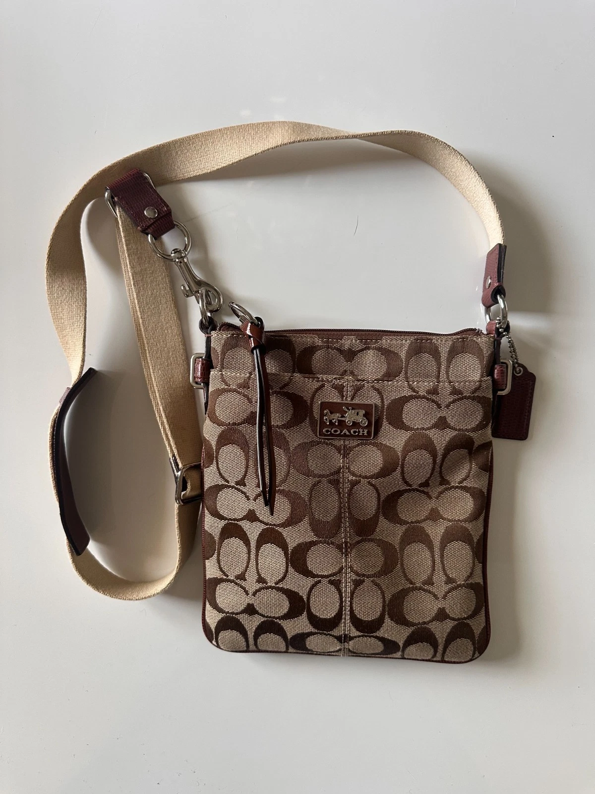 Borsa a tracolla Coach marrone tela pelle firma Hampton Swingpack