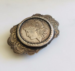 silver dollar buckle