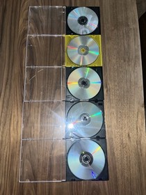 PlayStation 2 game lot disc only. Sega Saturn game Bug disc only. 