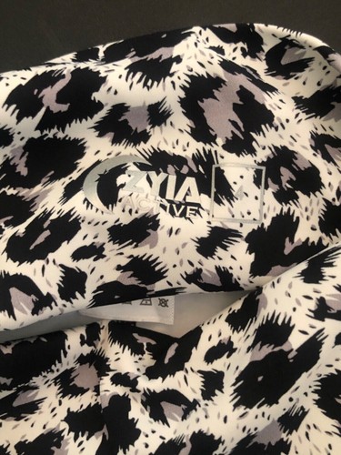 ZYIA LEGGINGS ALLENAMENTO ATTIVO TASCHE LATERALI STAMPA ANIMALIER 4 PICCOLI - Foto 8 di 8