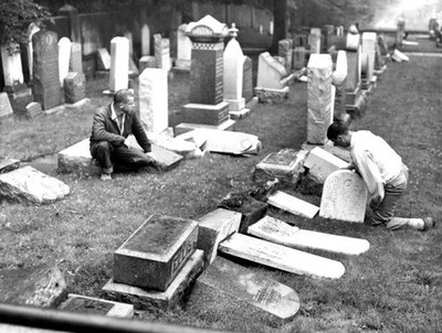 Caretaker William Hubner right inspects damage done by vandal- Boston Old Photo