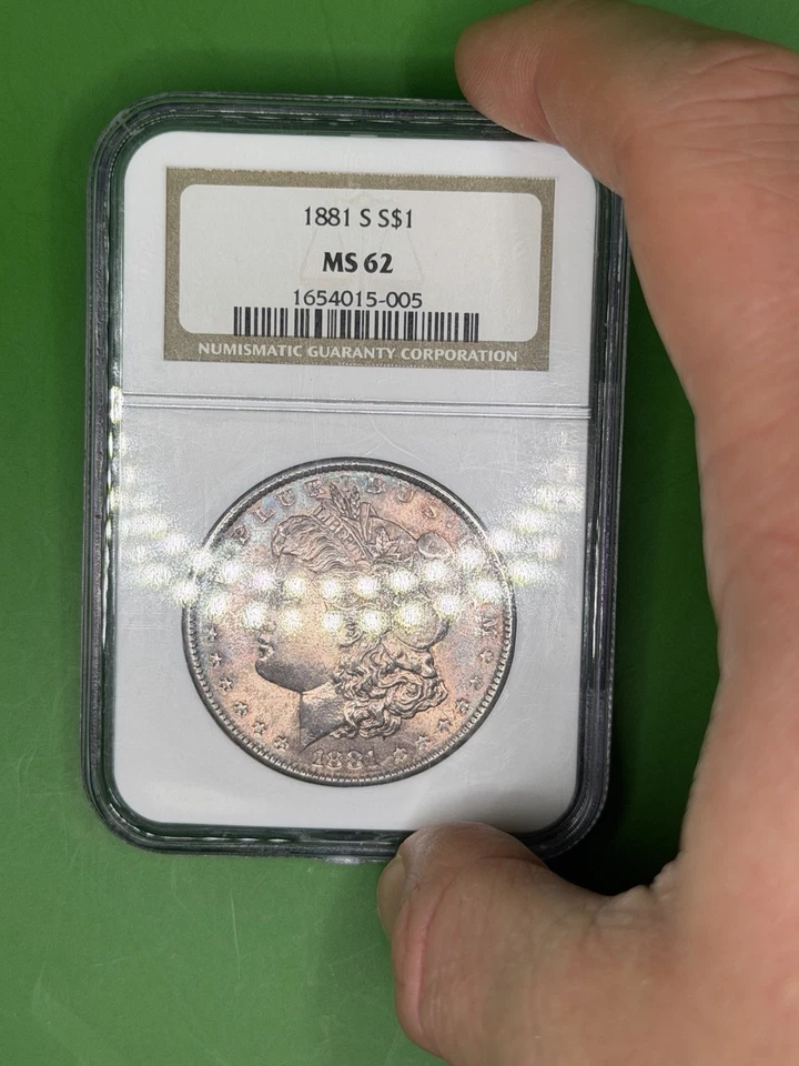 Antiguo soporte para jabonera NGC 1881-S dólar de plata Morgan tono bronceado (terminal) Foto 3 de 4