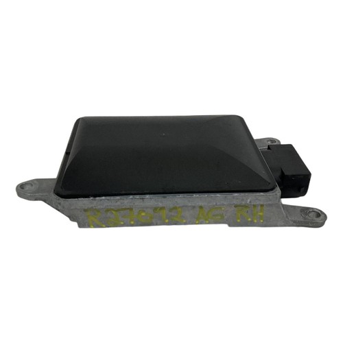 Black rectangular Porsche Macan right passenger blind spot radar module with visible wiring and yellow text “8T0907568B.”
