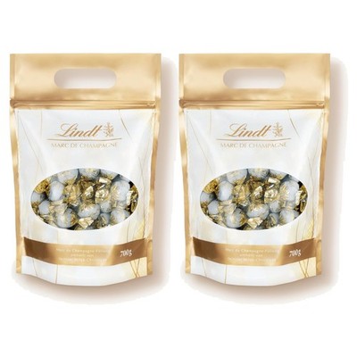 LINDT 2x Schokolade Marc de Champagne Kugeln 13,56 /kg MHD 07/26 je 700g Beutel