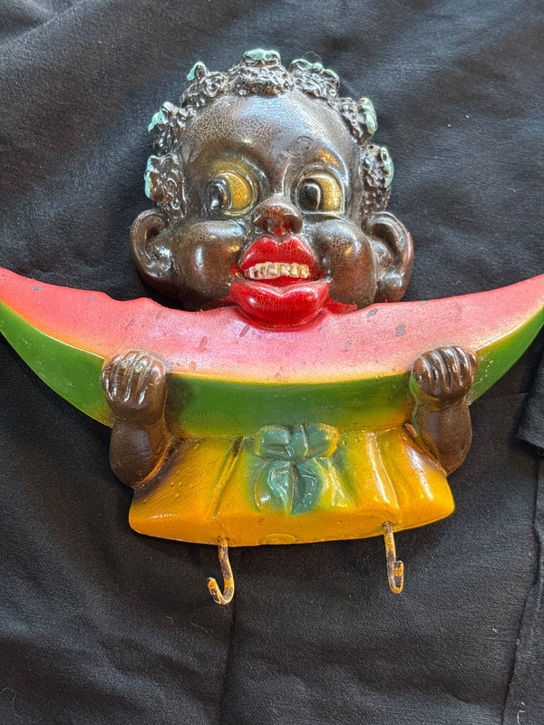 1900 chalkware child eating watermelon